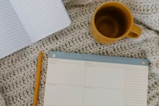 planner with coffee